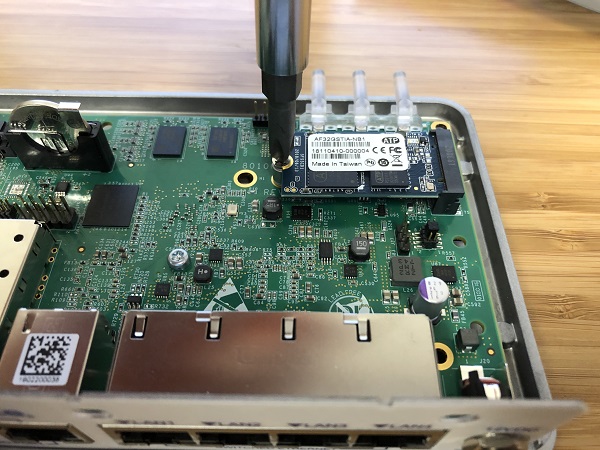 ../_images/netgate-2100-m2-sata-installed.jpg